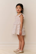Girls' ivory floral cotton dress with ruffled tiers and flutter cap sleeves
