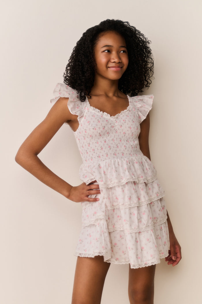 Ivory floral cotton dress with gathered waist and tiered ruffle skirt, front view