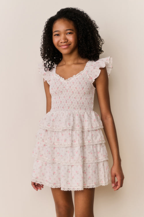 Ivory floral cotton dress with short flutter sleeves and layered ruffle skirt