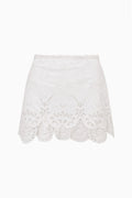 Optic white eyelet mini skirt with decorative lace overlay