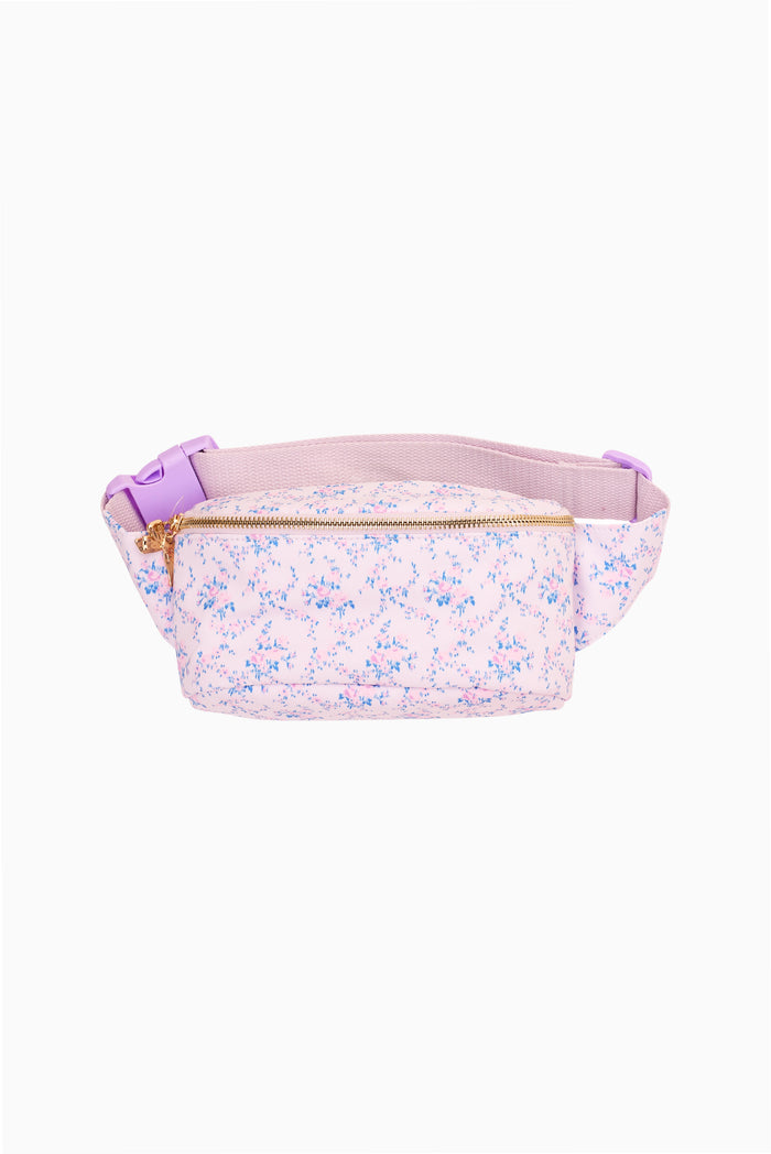 Mauve floral fanny pack with gold zipper and adjustable belt strap