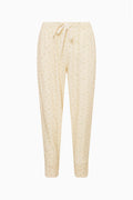 Ditsy floral sweatpants, pale yellow/cream with drawstring waist and tapered cuffs