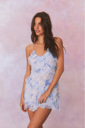 Light blue floral print silk mini dress with spaghetti straps and ruffled skirt