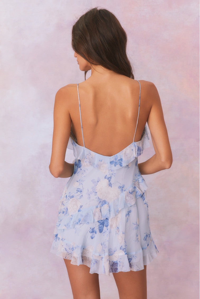Light blue floral print silk mini dress with spaghetti straps and low back