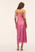 Pink lace bow maxi dress back view with open back and scalloped lace hem