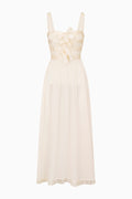 Cream sheer maxi dress with bow-banded bodice and lace hem