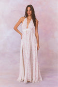 White base floral halter maxi dress with gathered waist and sheer skirt