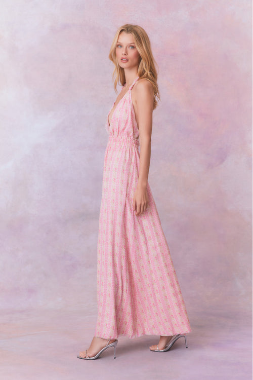 Pink floral print halter maxi dress, side view with open tie neckline