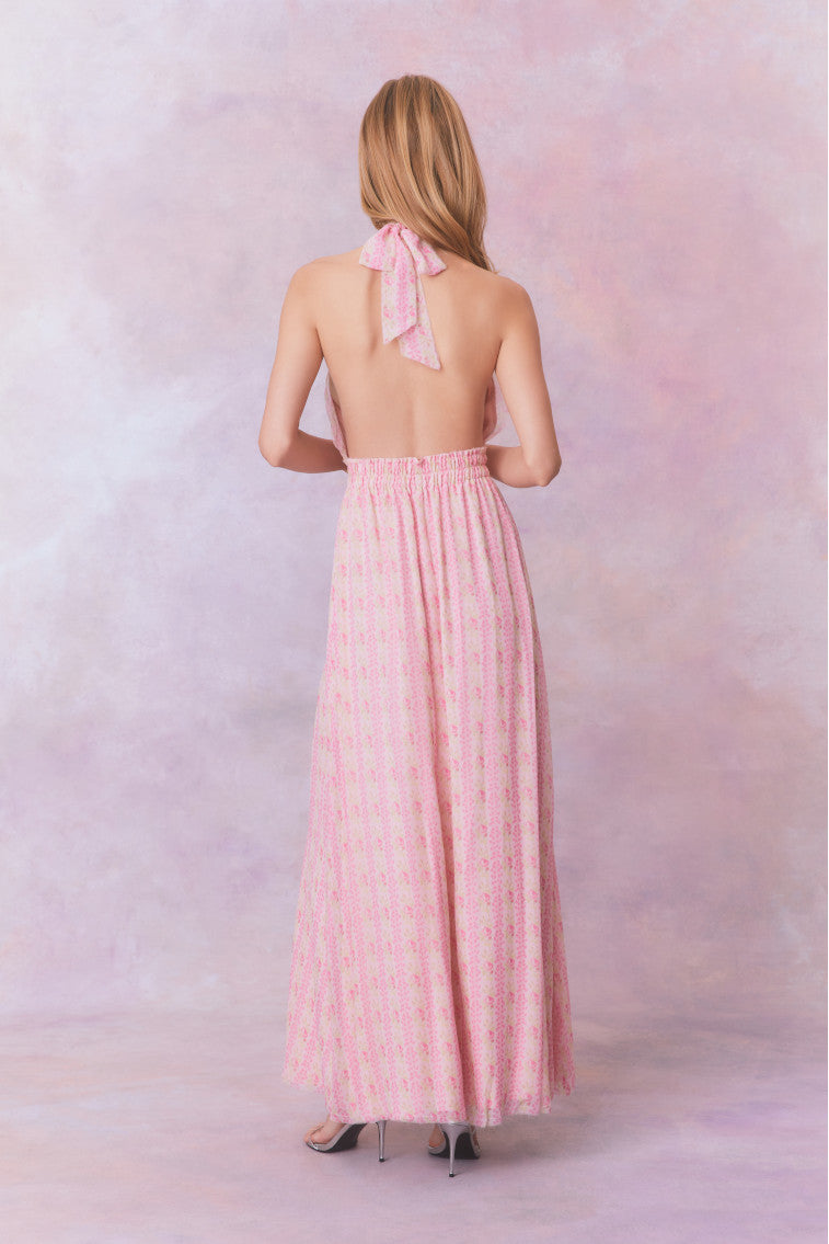 Pink floral print halter maxi dress, back view with tie halter and gathered waist