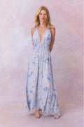 Light blue floral halter maxi dress with gathered bodice and flowing skirt