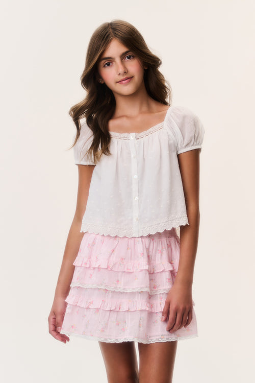 Pink ditsy floral tiered ruffle mini skirt with elastic waist, scalloped hem