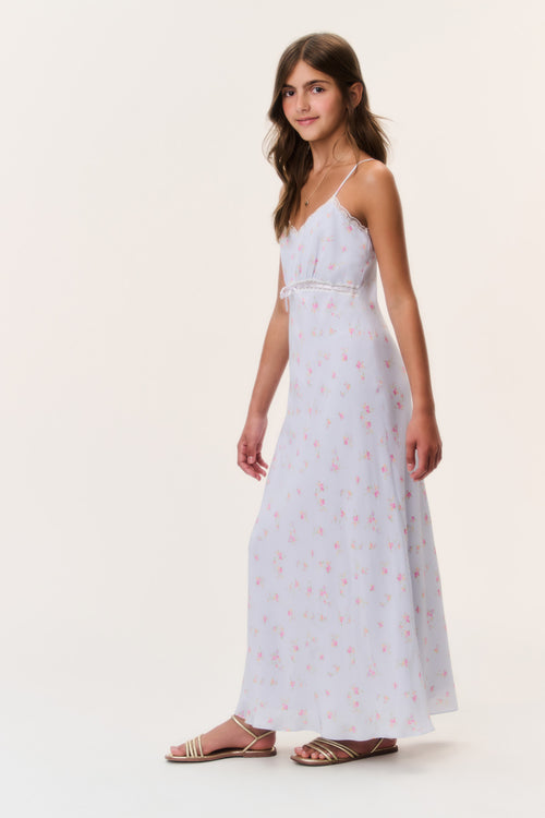 Tween floral crepe dress in pale periwinkle, side view, spaghetti straps and long hem