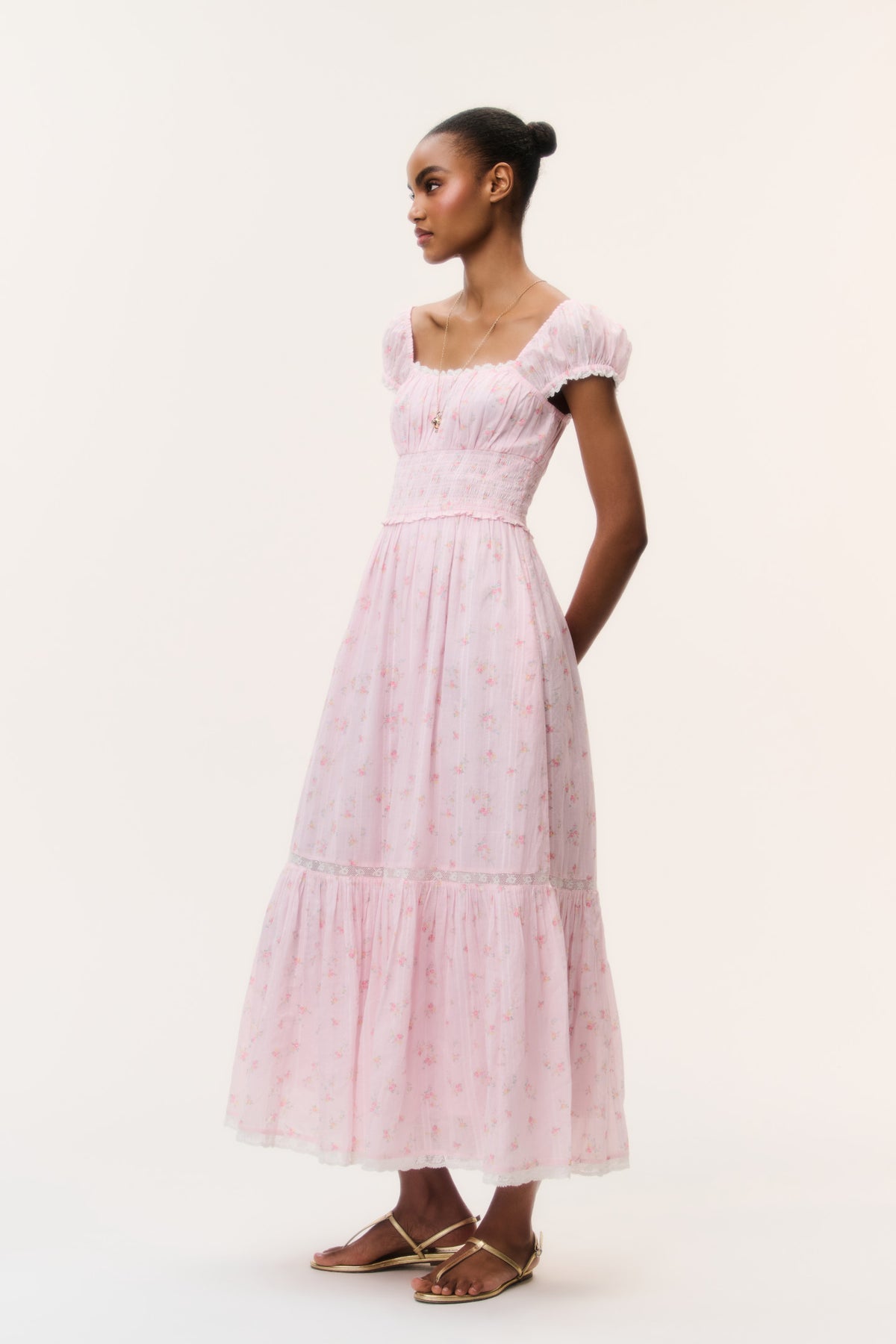 Pink floral cotton maxi dress with ruched smocked bodice and puff sleeves
