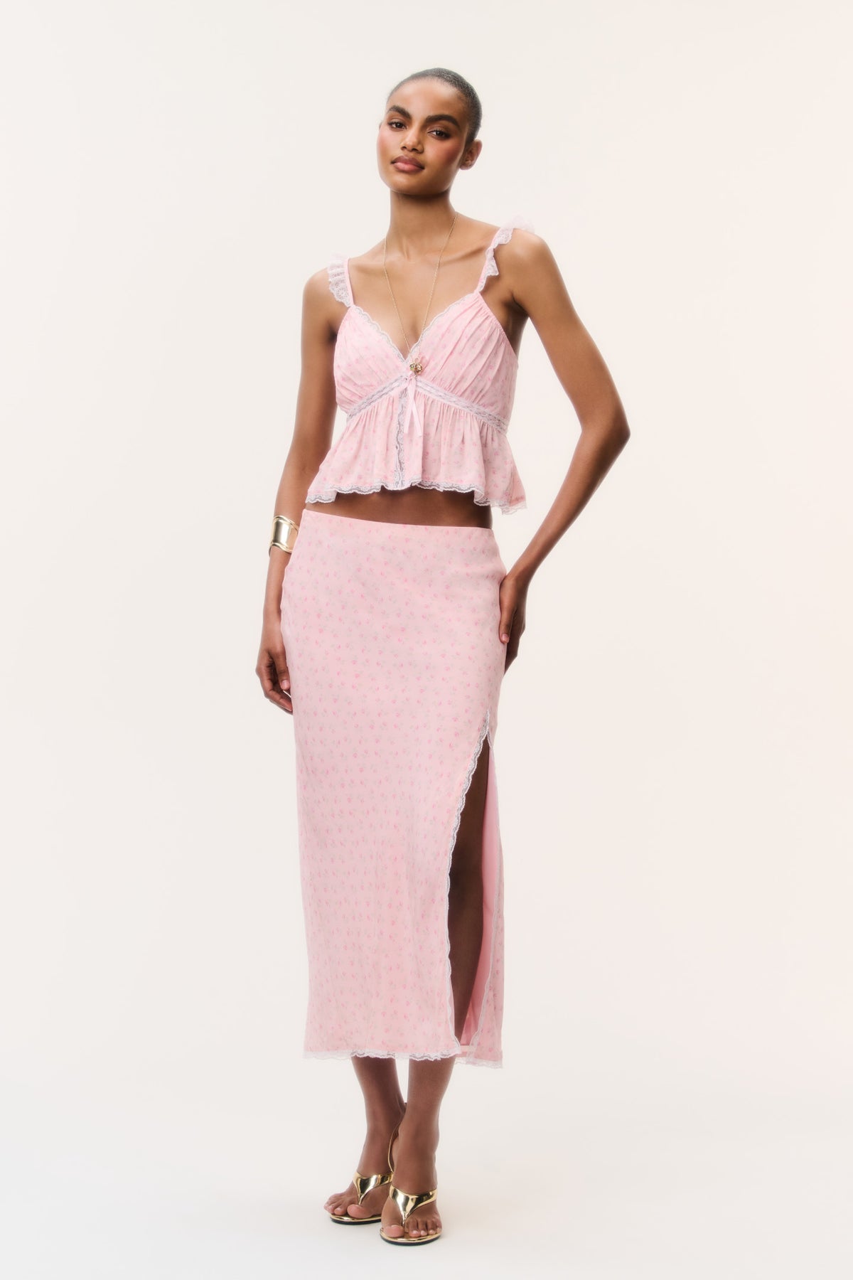 Pink crepe midi skirt with front slit and tiny allover print