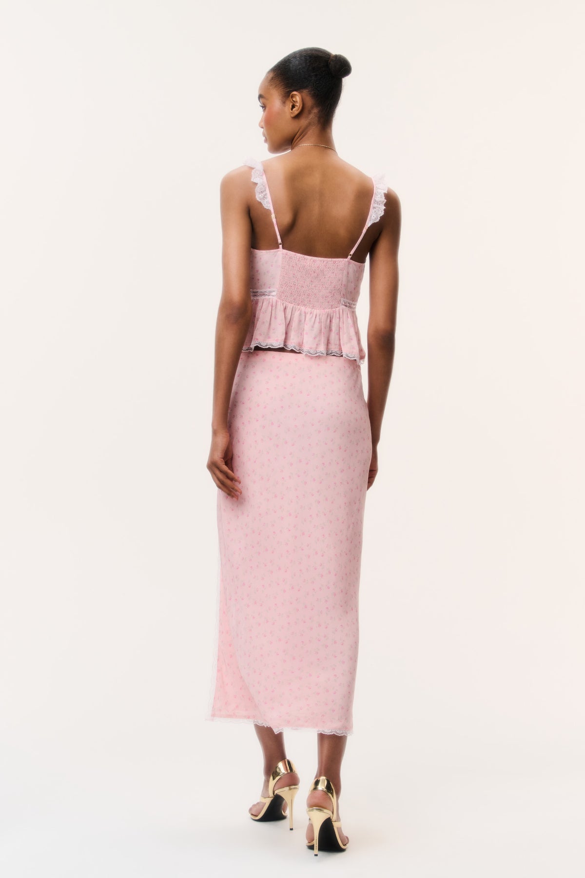 Pink crepe midi skirt with front slit and allover tiny print, back view