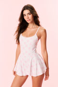 Pink printed active skater dress with spaghetti straps and fitted bodice