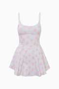 Pink bow-printed active dress with spaghetti straps and skater skirt