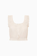White eyelet crop top with ruffled square neckline, short sleeves, and button front