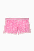 Pink bow-pattern boxy shorts with lace-trim hem and elastic waist