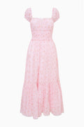 Pink floral cotton maxi dress front view with square neckline and tiered skirt
