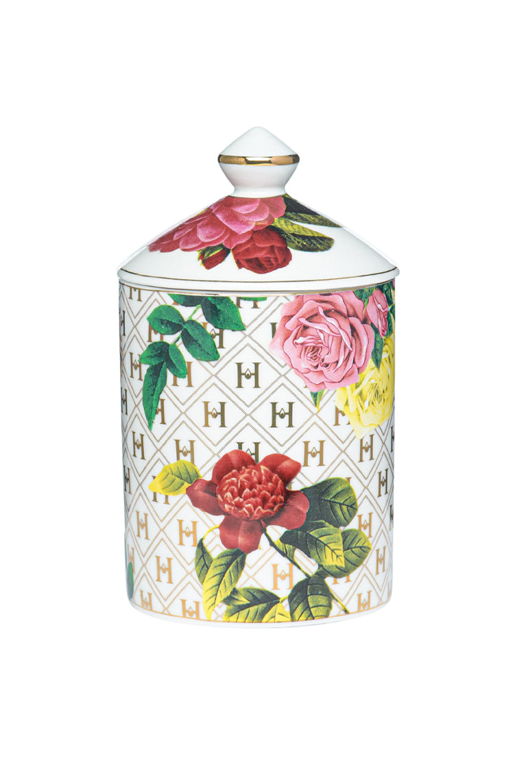 Floral ceramic candle jar with pink rose and yellow flower bouquet pattern