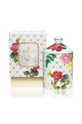 Ceramic candle jar with matching lid and floral label insert