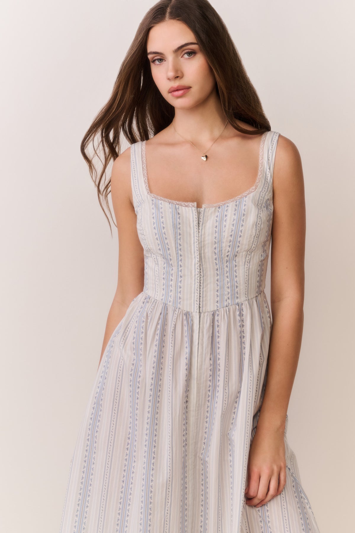Light blue pinstripe cotton bustier midi dress bodice with square neckline and pleated waist