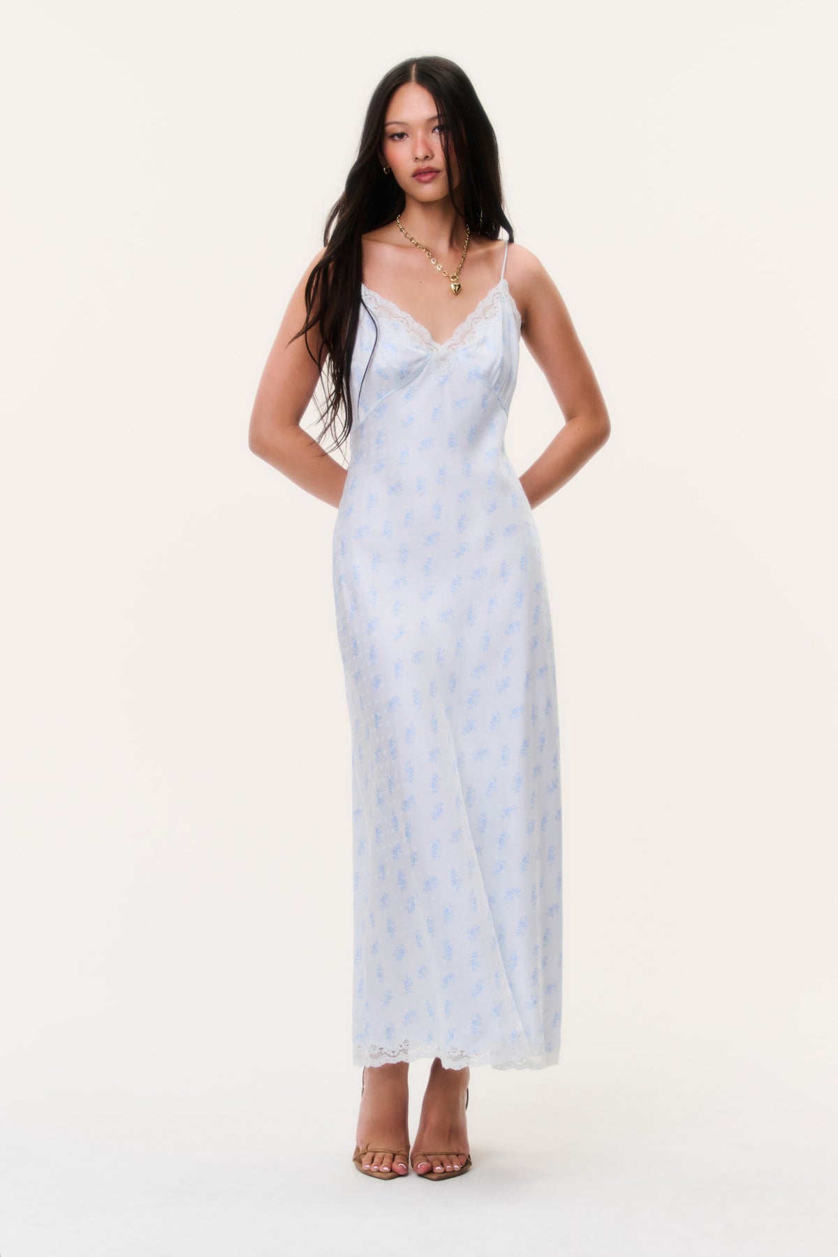 Light blue maxi slip dress with thin straps, lace-trim neckline and fitted bodice