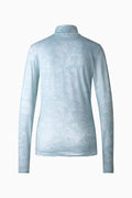 Women’s half-zip pullover in light blue with subtle allover pattern, long sleeves