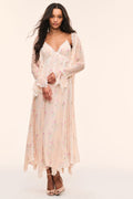 Sheer floral silk duster with lace-trim V neckline and long ruffled sleeves