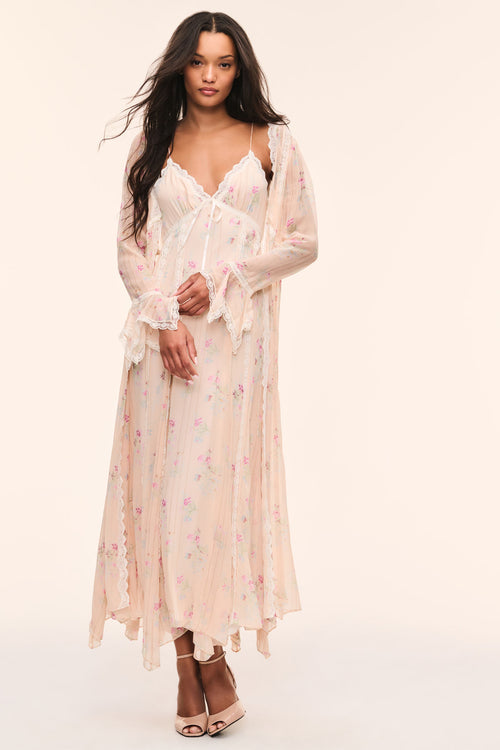 Sheer floral silk duster with lace-trim V neckline and long ruffled sleeves