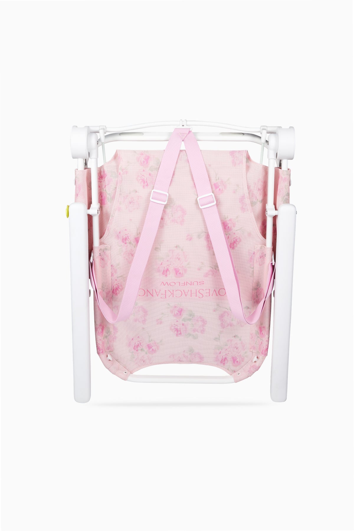Pink floral ikat beach chair with white frame and fabric seat