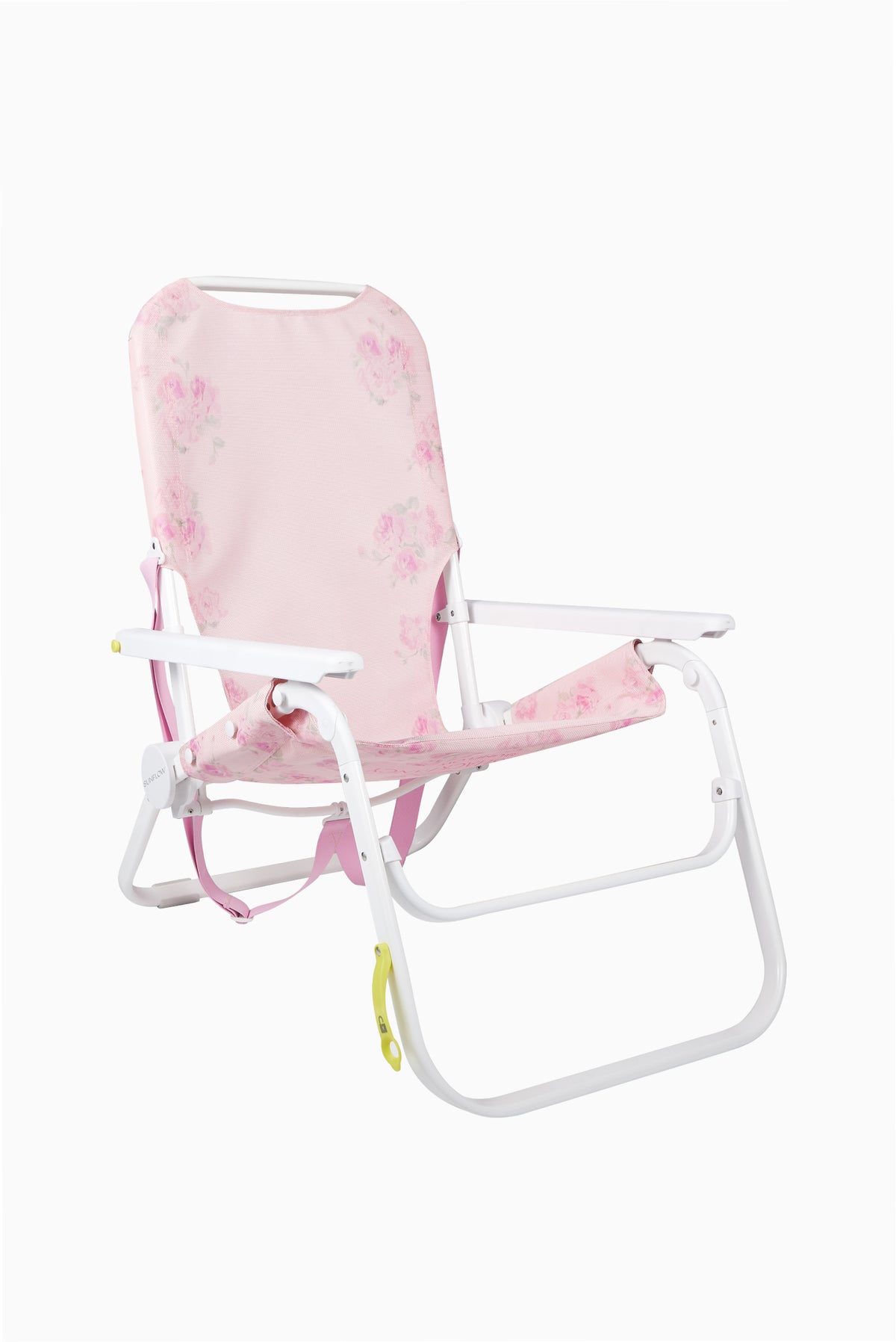 Pink floral ikat beach chair with white frame and adjustable armrests