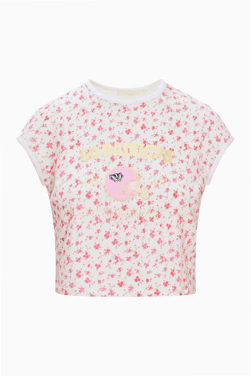 Cream floral ringer tee with white crew neck trim and centered team graphic