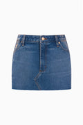 Medium-wash denim mini skirt, button front with belt loops and patch pockets
