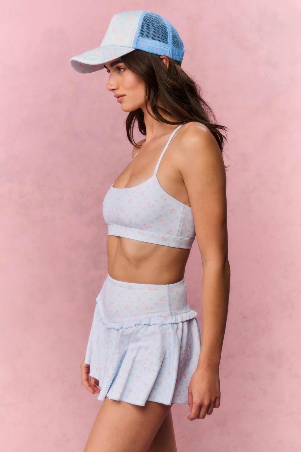 Light blue sports bra with spaghetti straps and allover micro print