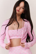 Pink sweetheart sports bra with thin straps and geometric pattern