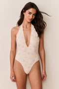 Floral halter one-piece swimsuit with V-front and cheeky coverage, pastel pink and yellow