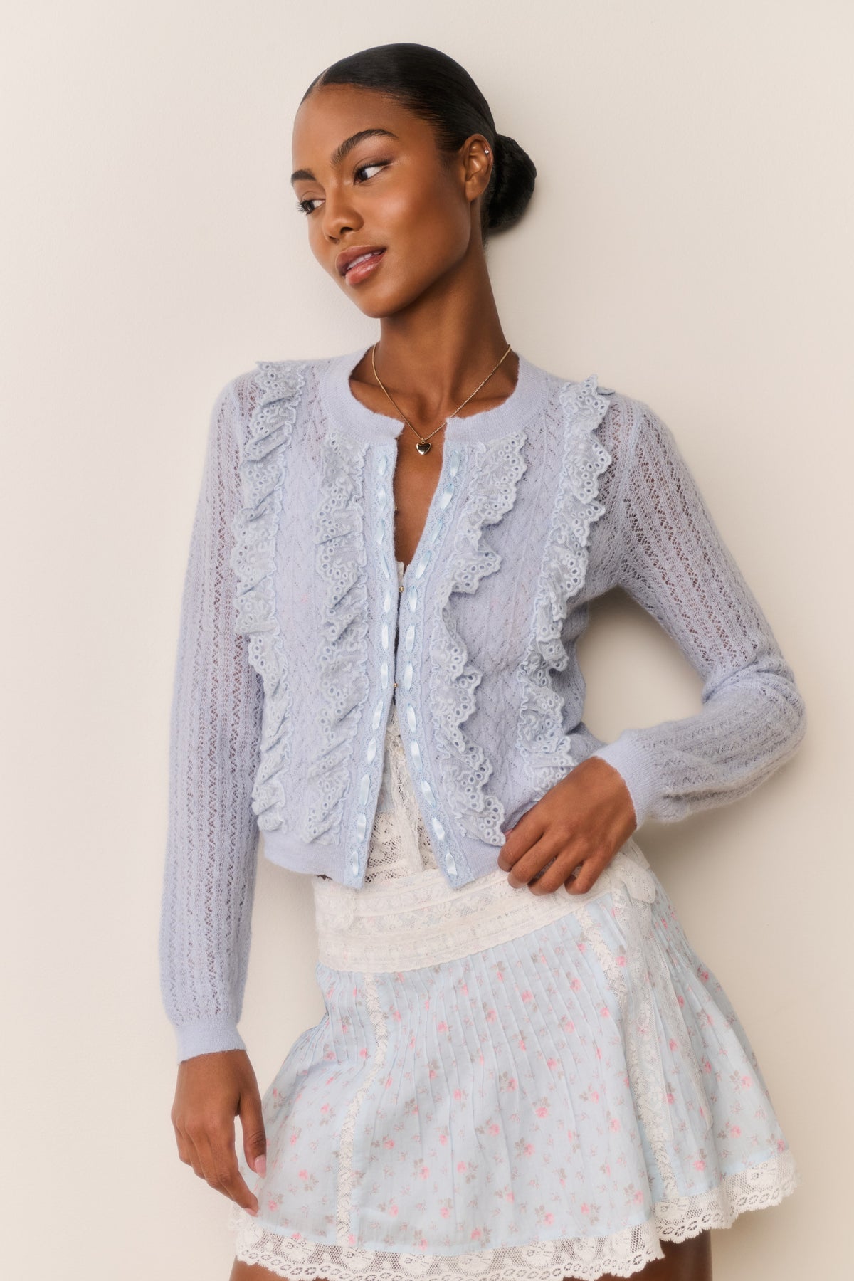 Light blue lace-trim eyelet ruffle cardigan with button-front and long sleeves