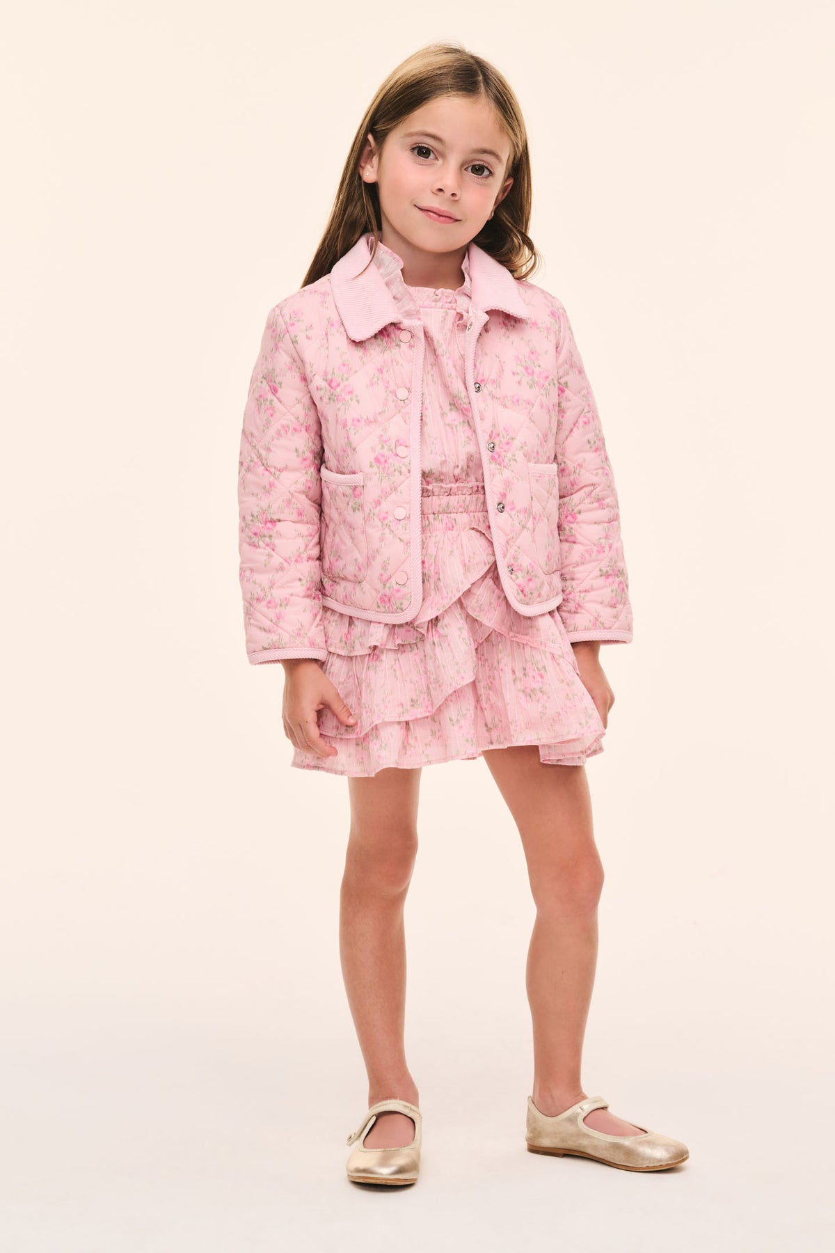 Girls' pink floral quilted jacket with button placket and patch pockets