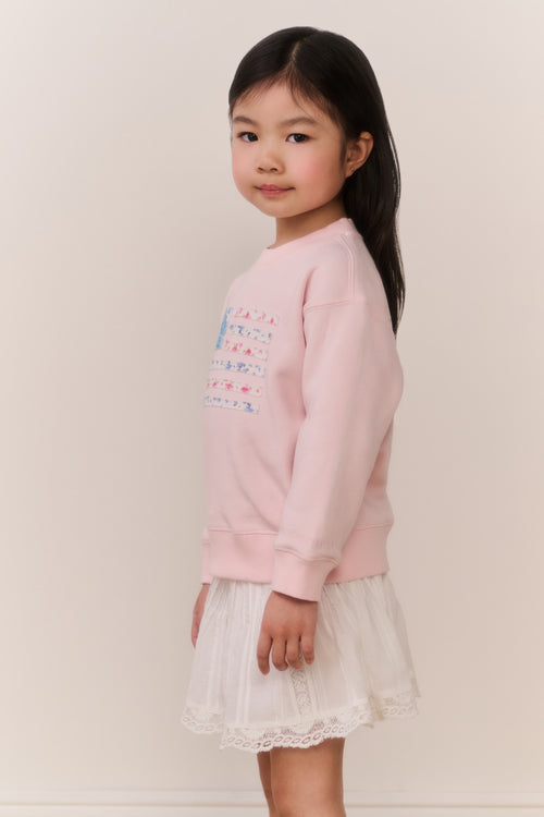 Girls' pink crewneck pullover with colorful front graphic and long sleeves