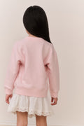 Girls' pink pullover back view with colorful graphic, long sleeves