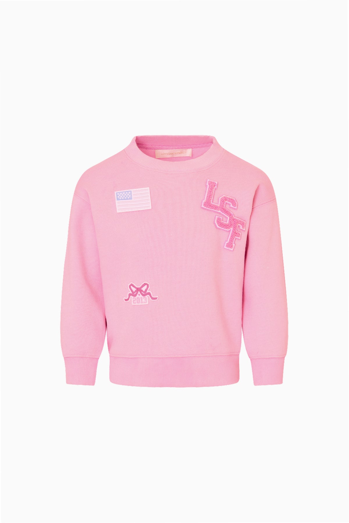 Pink girls crewneck sweatshirt with front chest graphic and patch