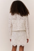Ivory lace jacket back view with scalloped hem and fitted waist