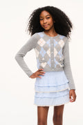 Light blue tiered ruffle skirt with elastic waist and layered frills