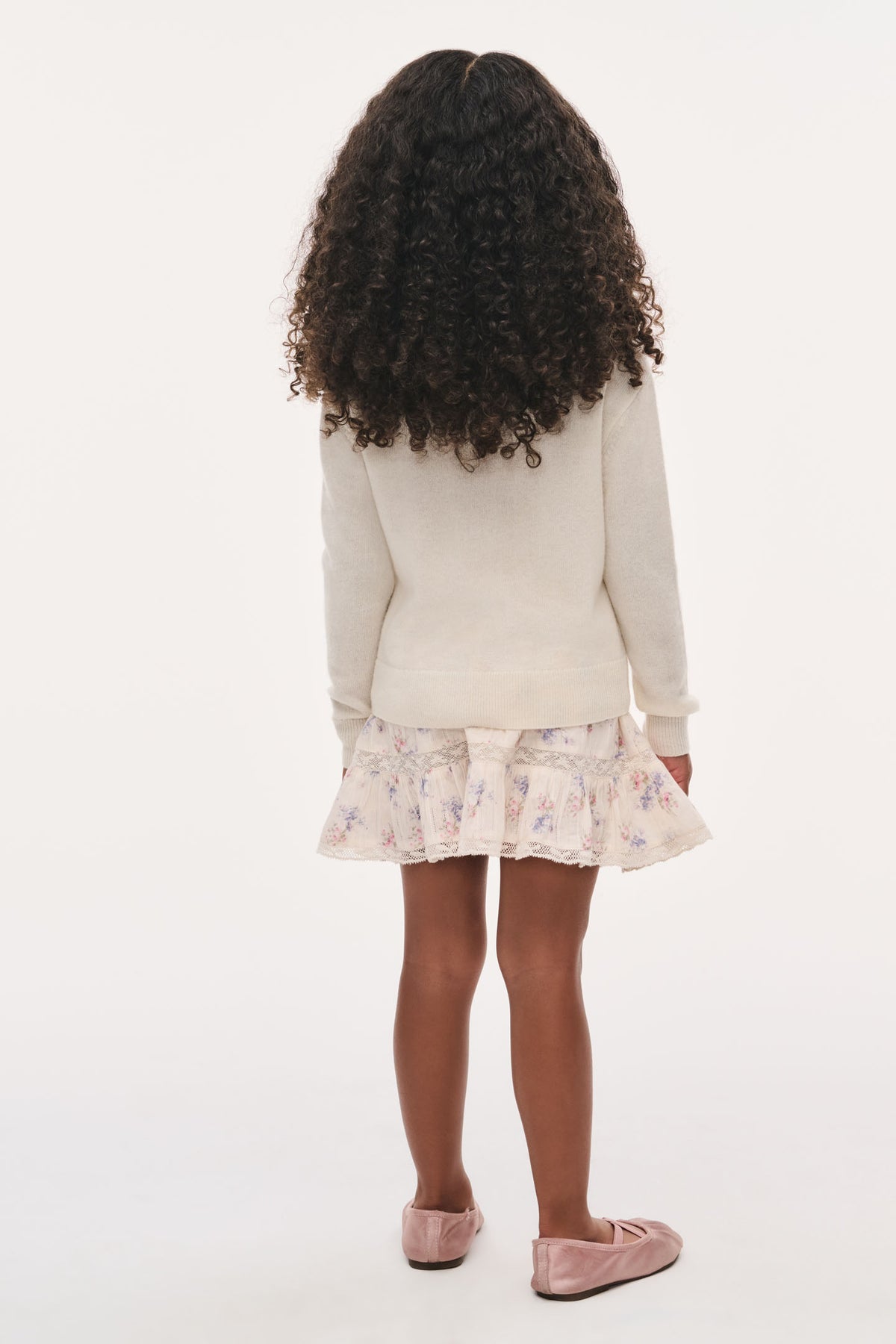 Girls ivory mini pullover with long sleeves and crew neck