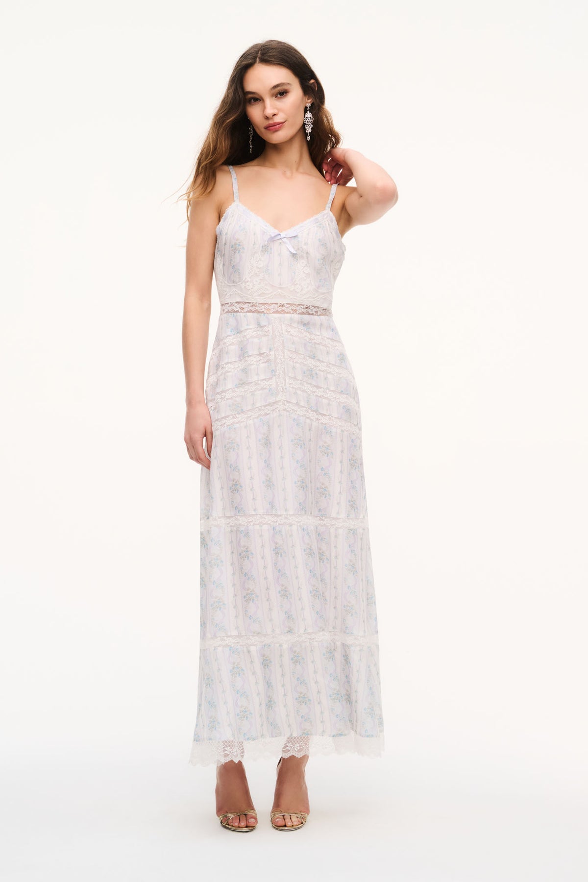 Floral lace maxi dress with spaghetti straps, bow detail, and tiered skirt