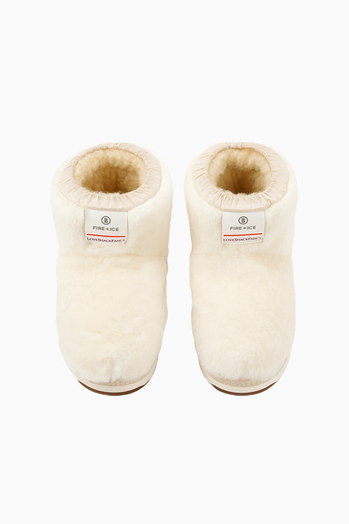 Off-white girls ankle boots with faux-fur lining and small logo label on the side