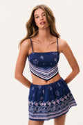 Navy bandana print mini skort with elastic waist and allover decorative border