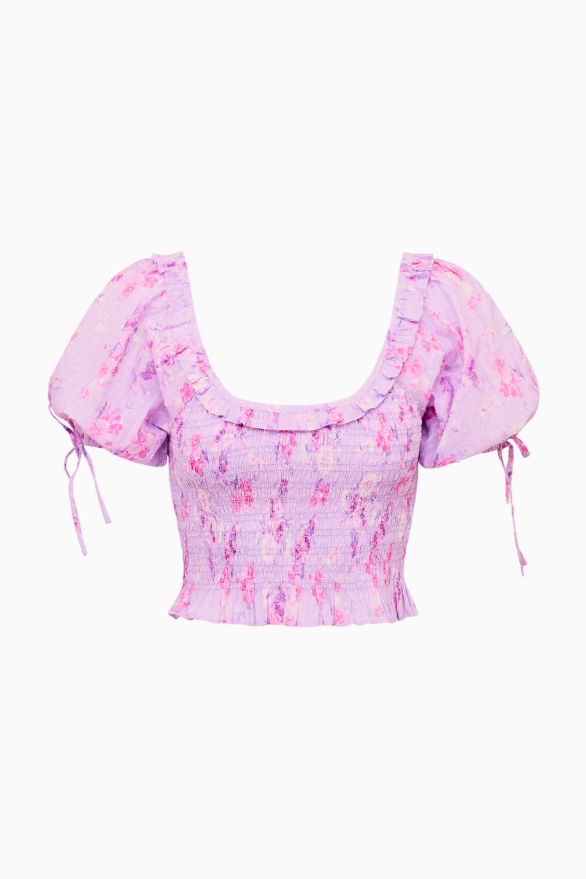 Pink printed smocked peplum top with puff sleeves and ribbon tie details